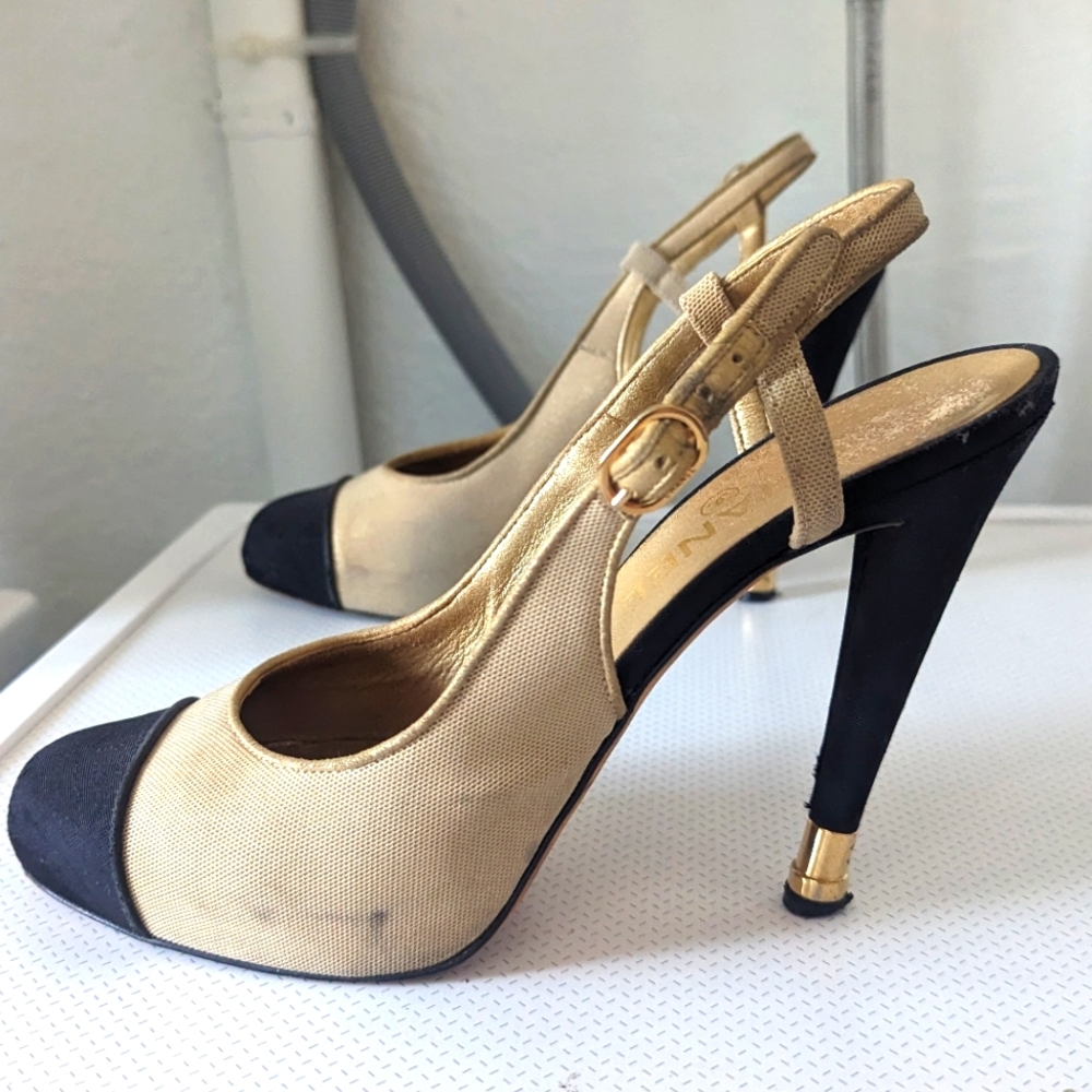 CHANEL Beige and Black Slingback Heels with Gold Accents
